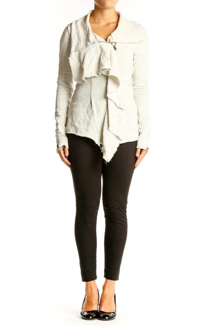 Front view of white ruffled cotton zip-up jacket from WE THE FREE