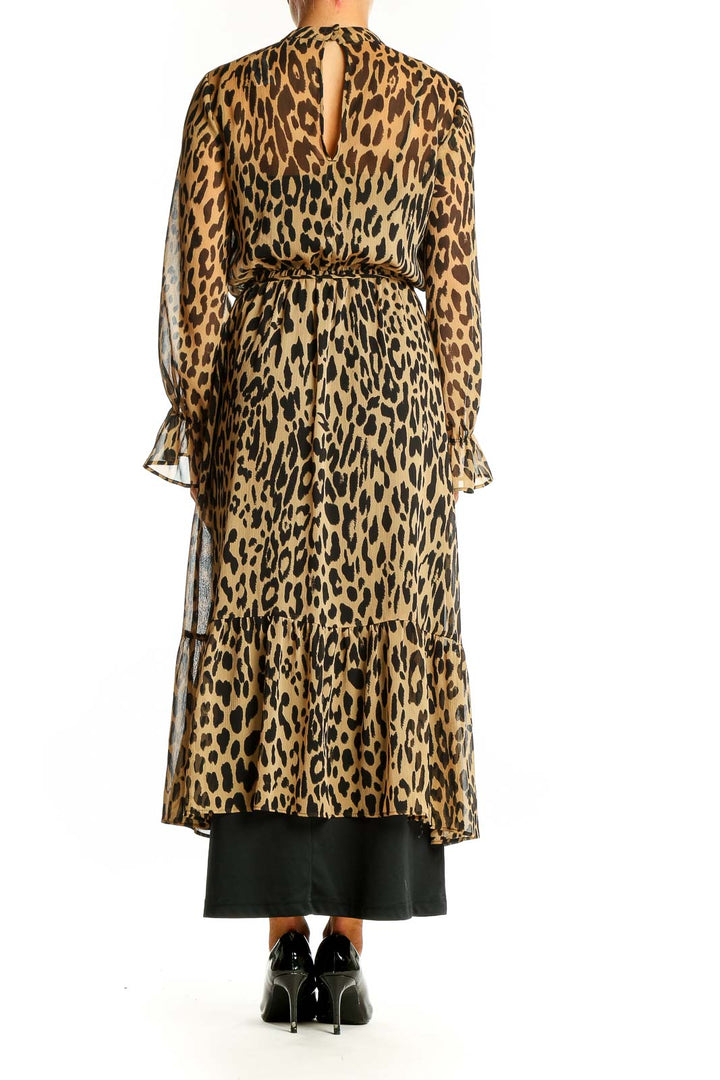 Back view of Banana Republic tan leopard print maxi dress showing full length