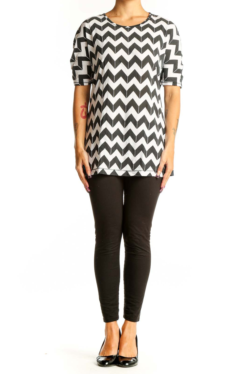 Front view of Lululemon black and white chevron print top