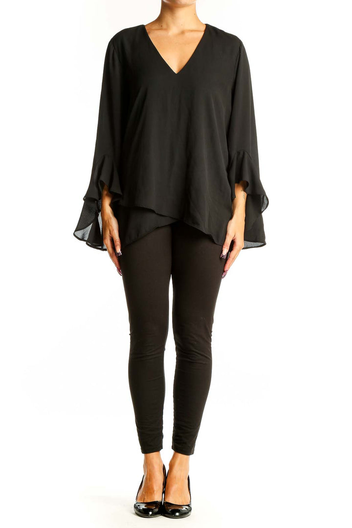 Front view of black Vince Camuto V-neck blouse with bell sleeves