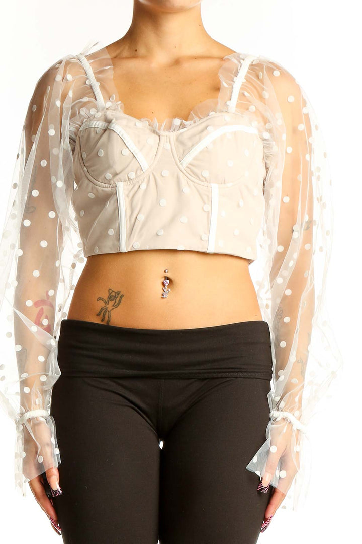 Front view of RNWY Runawaythelabel White Polka Dot Sheer Sleeve Crop Top