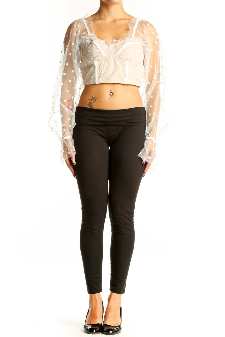 Front view of RNWY Runawaythelabel White Polka Dot Sheer Sleeve Crop Top