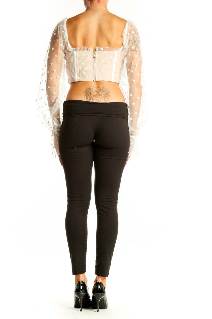 Back view of RNWY Runawaythelabel White Polka Dot Sheer Sleeve Crop Top
