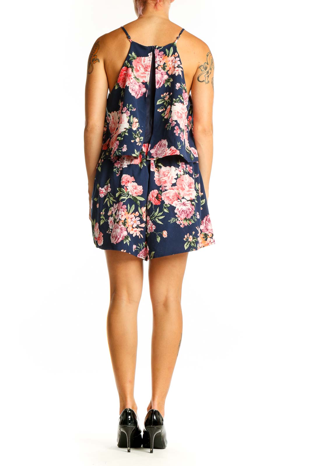 Side view of Lulu's navy floral romper showing full length and fit