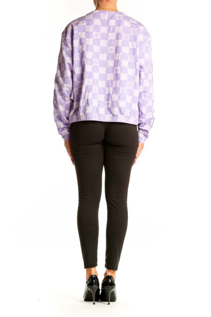Side view of purple checkered long sleeve top by JUICY by Juicy Couture showing black side stripe