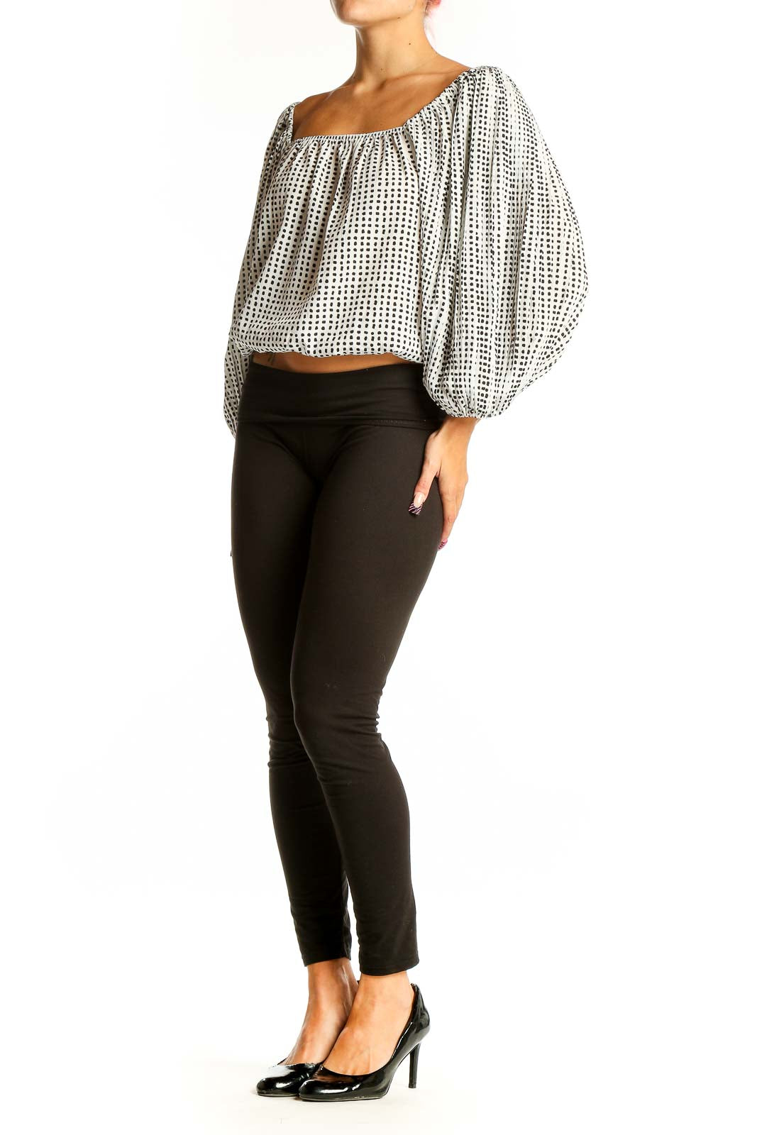 Front view of Lucy Paris White Polka Dot Crop Top with balloon sleeves