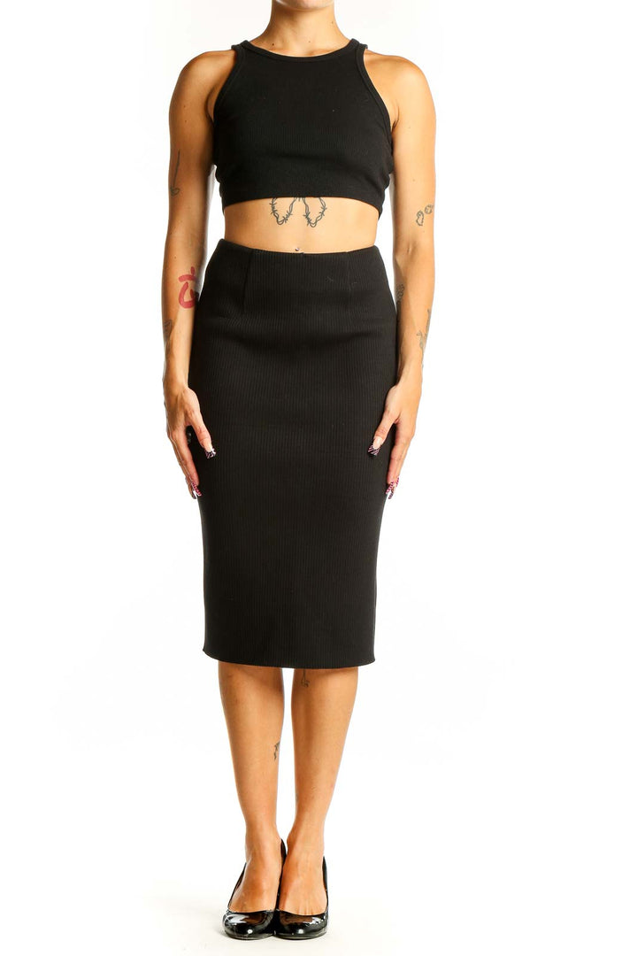 Front view of black fitted midi pencil skirt by Six Crisp Days