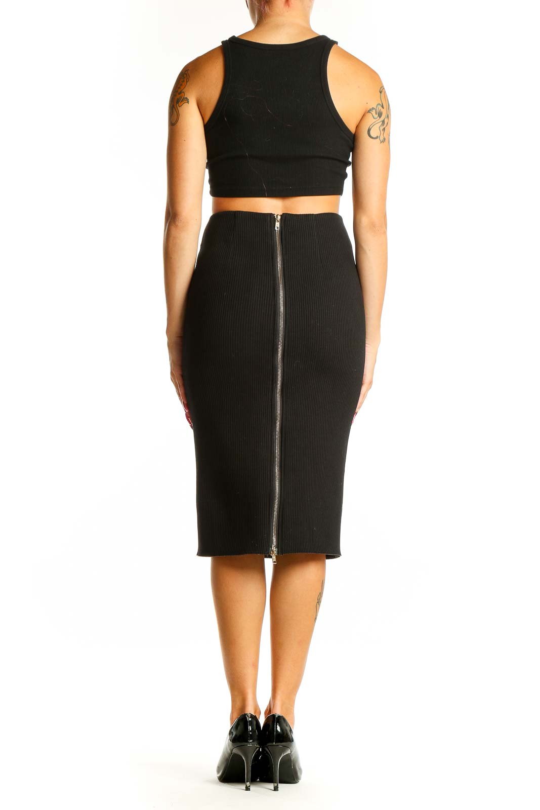 Side view of woman wearing black fitted midi pencil skirt by Six Crisp Days