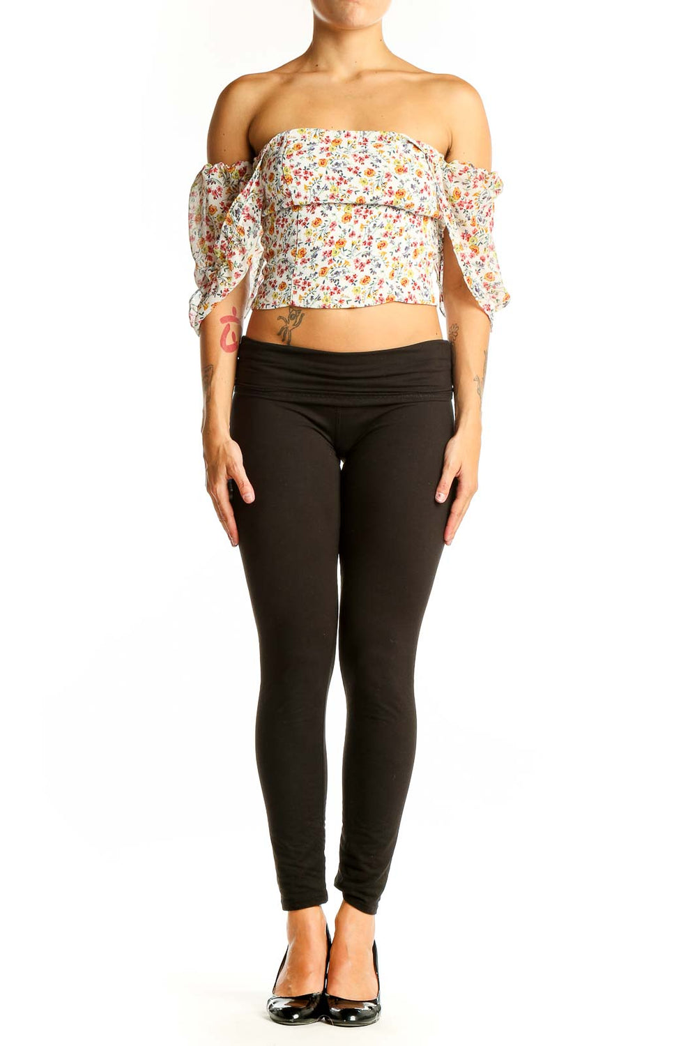 Front view of Flynn Skye floral off-shoulder crop top with puffy sleeves
