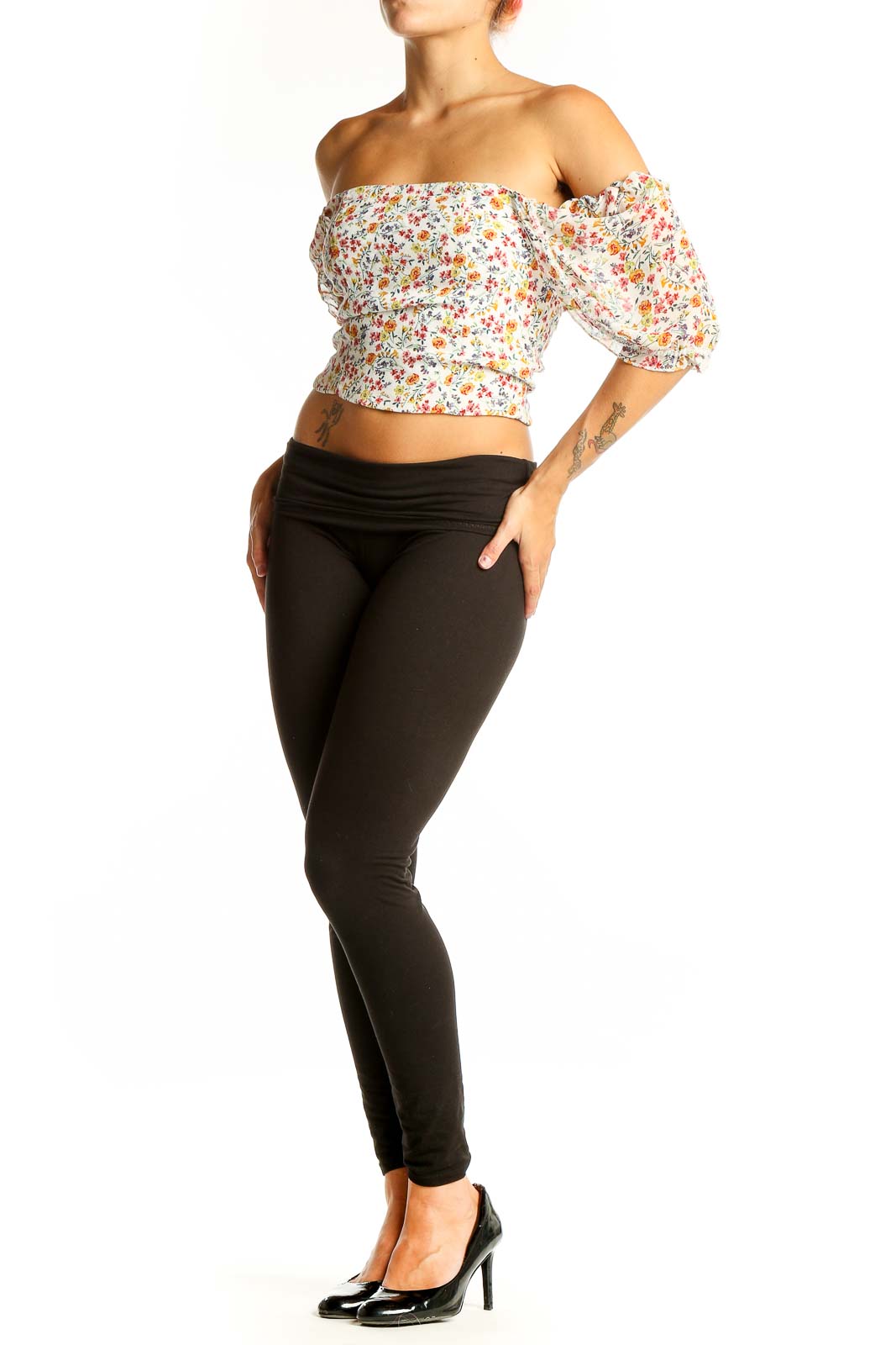 Front view of Flynn Skye floral off-shoulder crop top with puffy sleeves