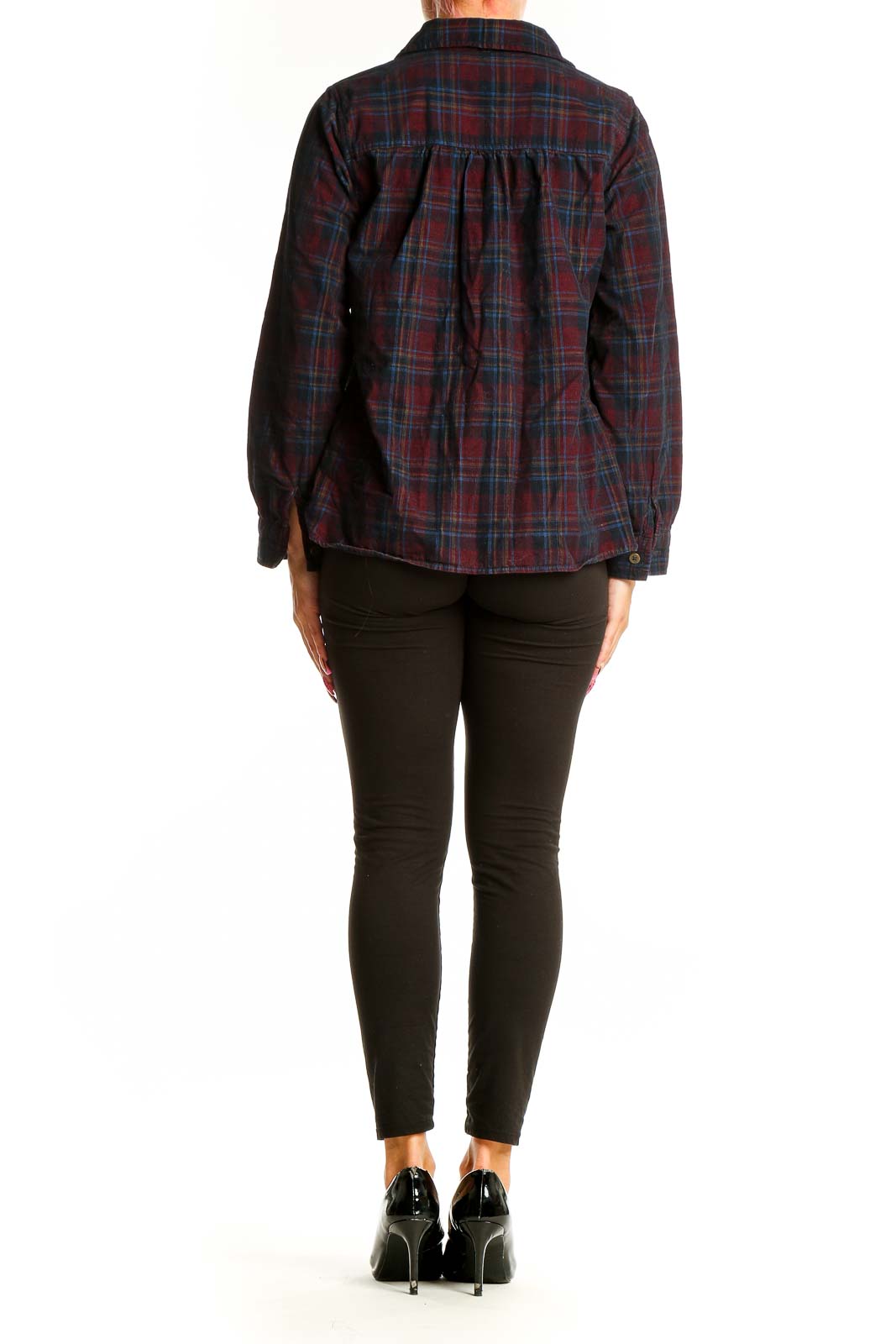 Side view of model wearing Christopher & Banks burgundy plaid cotton button-up shirt with black pants
