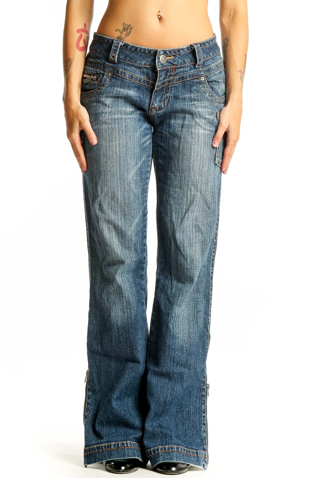 Front view of Rocawear blue distressed wide-leg jeans on model