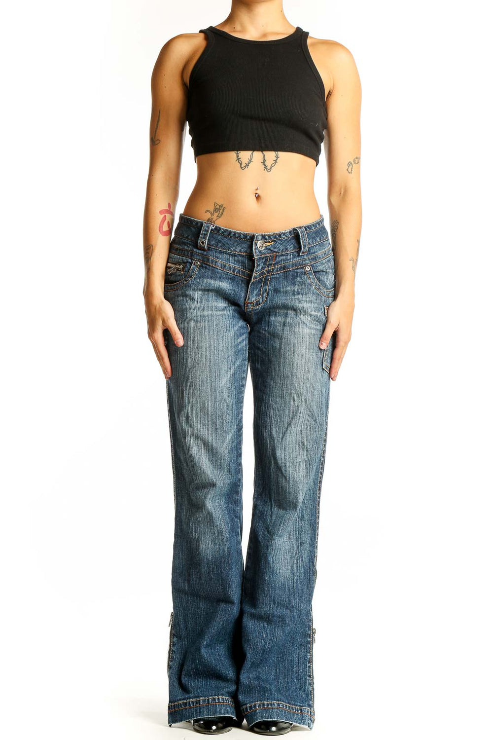 Front view of Rocawear blue distressed wide-leg jeans on model
