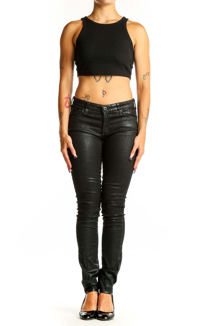 Front view of Adriano Goldschmied black coated skinny jeans on model