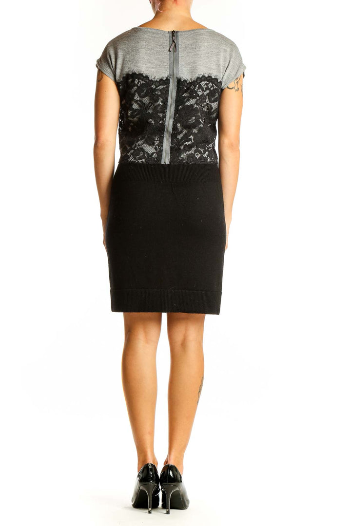 Side view of LOFT gray and black lace overlay knit dress