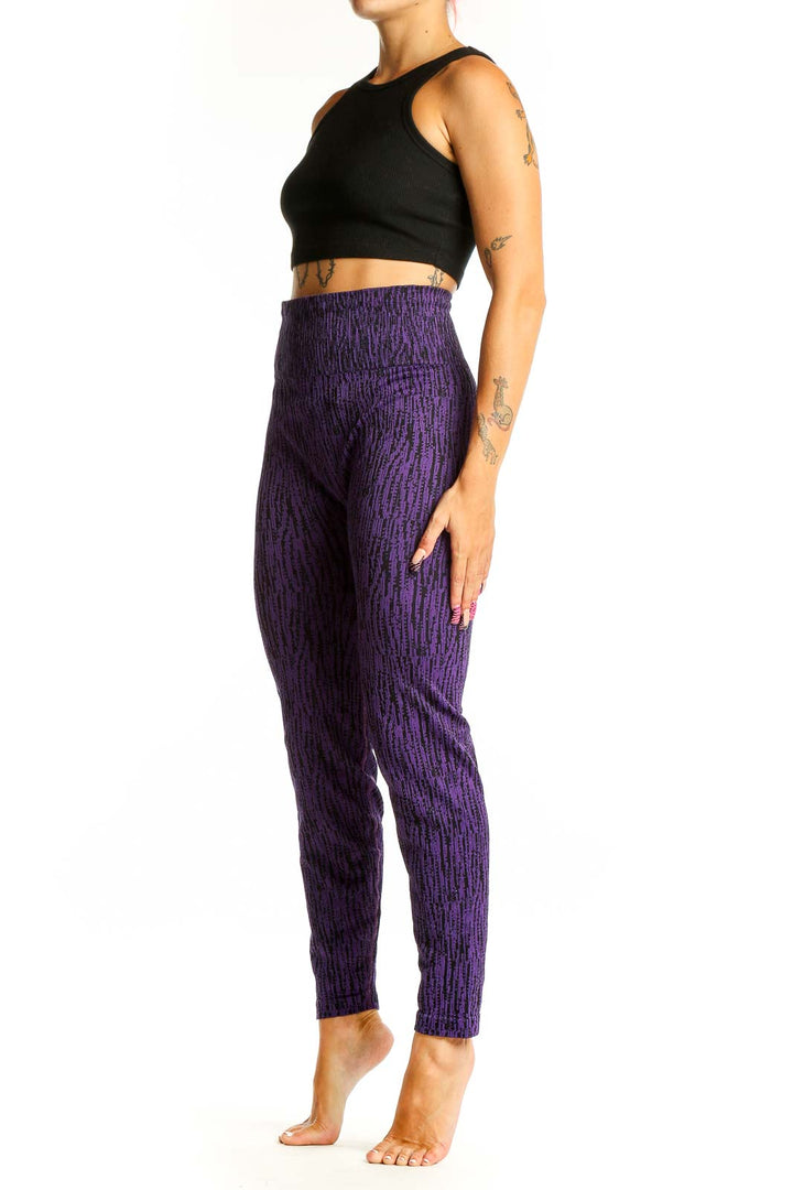 Front view of purple textured high-waist Athleta leggings