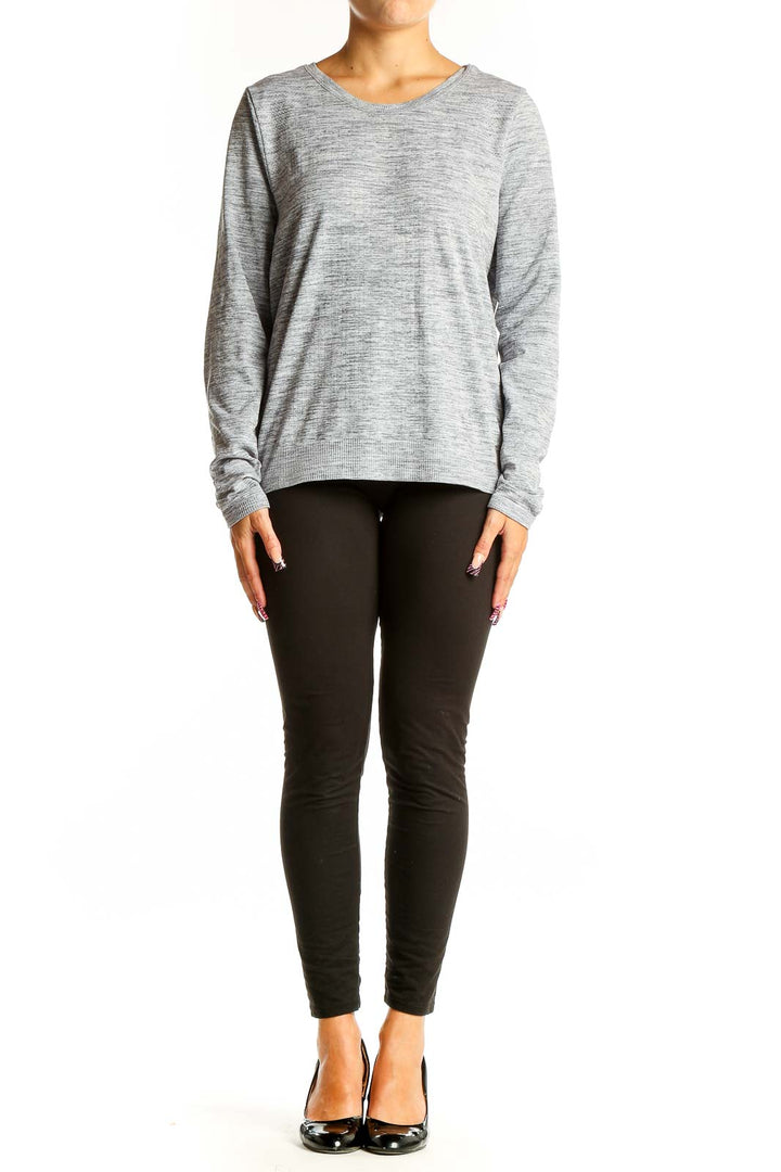 Front view of Athleta gray heathered long sleeve athletic top