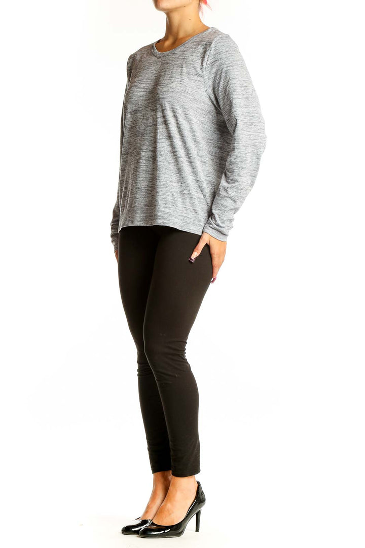 Front view of Athleta gray heathered long sleeve athletic top