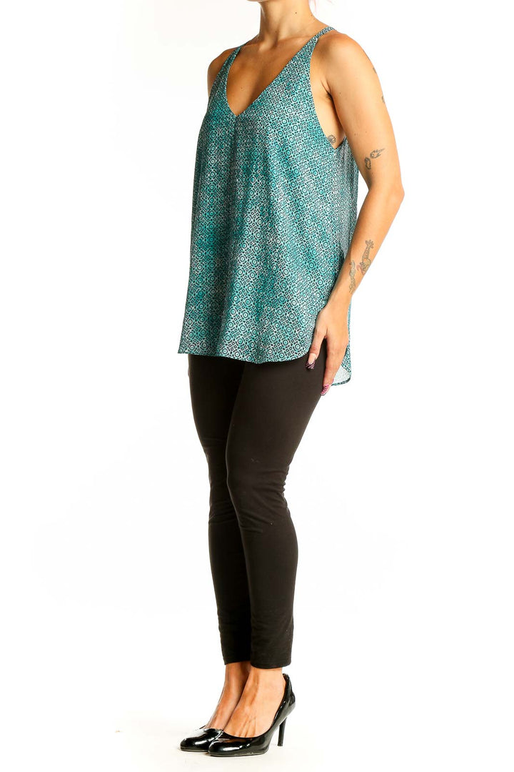 Front view of teal geometric print V-neck tank top by Tart