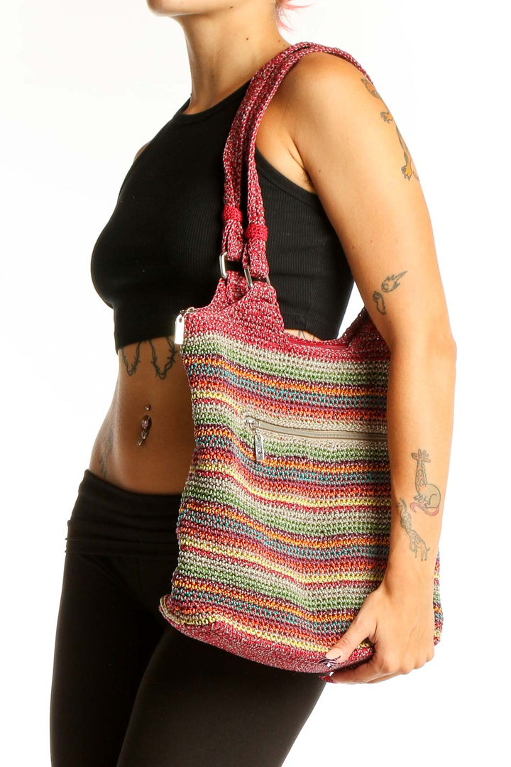 Front view of The Sak multicolor striped crochet shoulder bag