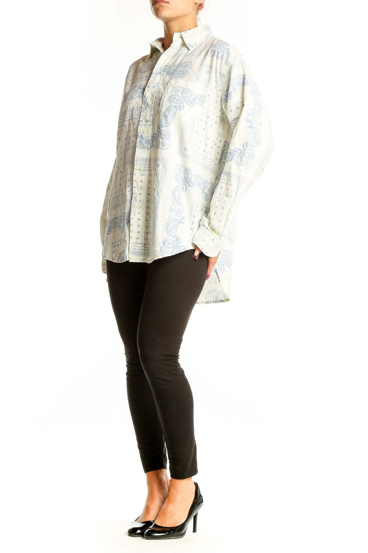 Front view of C/E Current/Elliott white and blue paisley print cotton button-up shirt