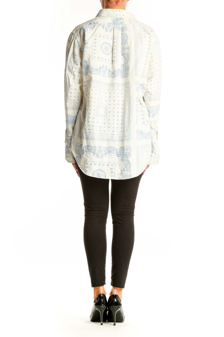 Back view of C/E Current/Elliott white and blue paisley print cotton button-up shirt on model
