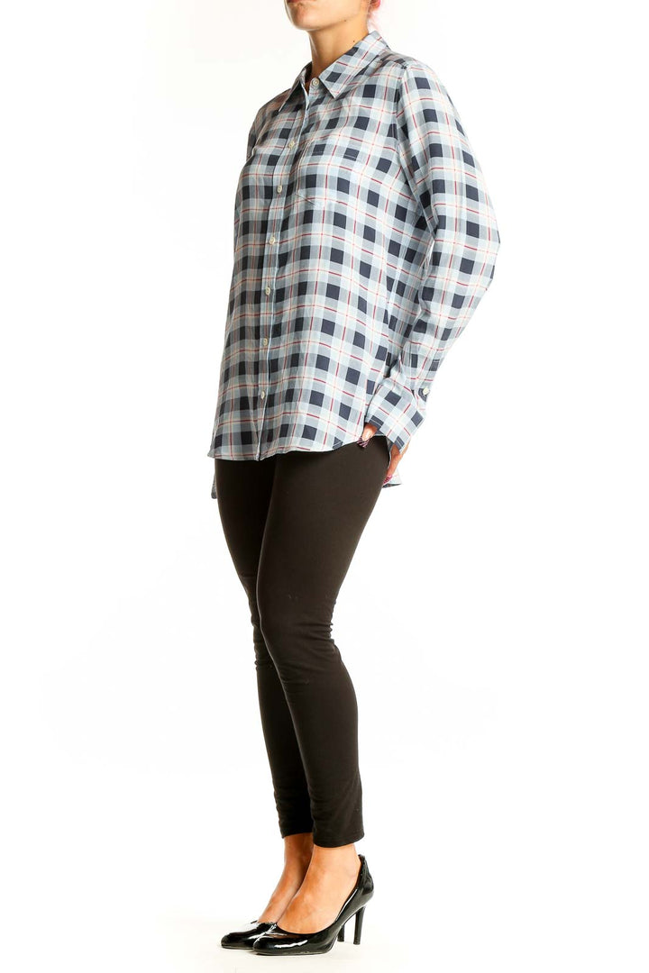 Front view of Equipment Femme blue and white plaid silk button-up shirt