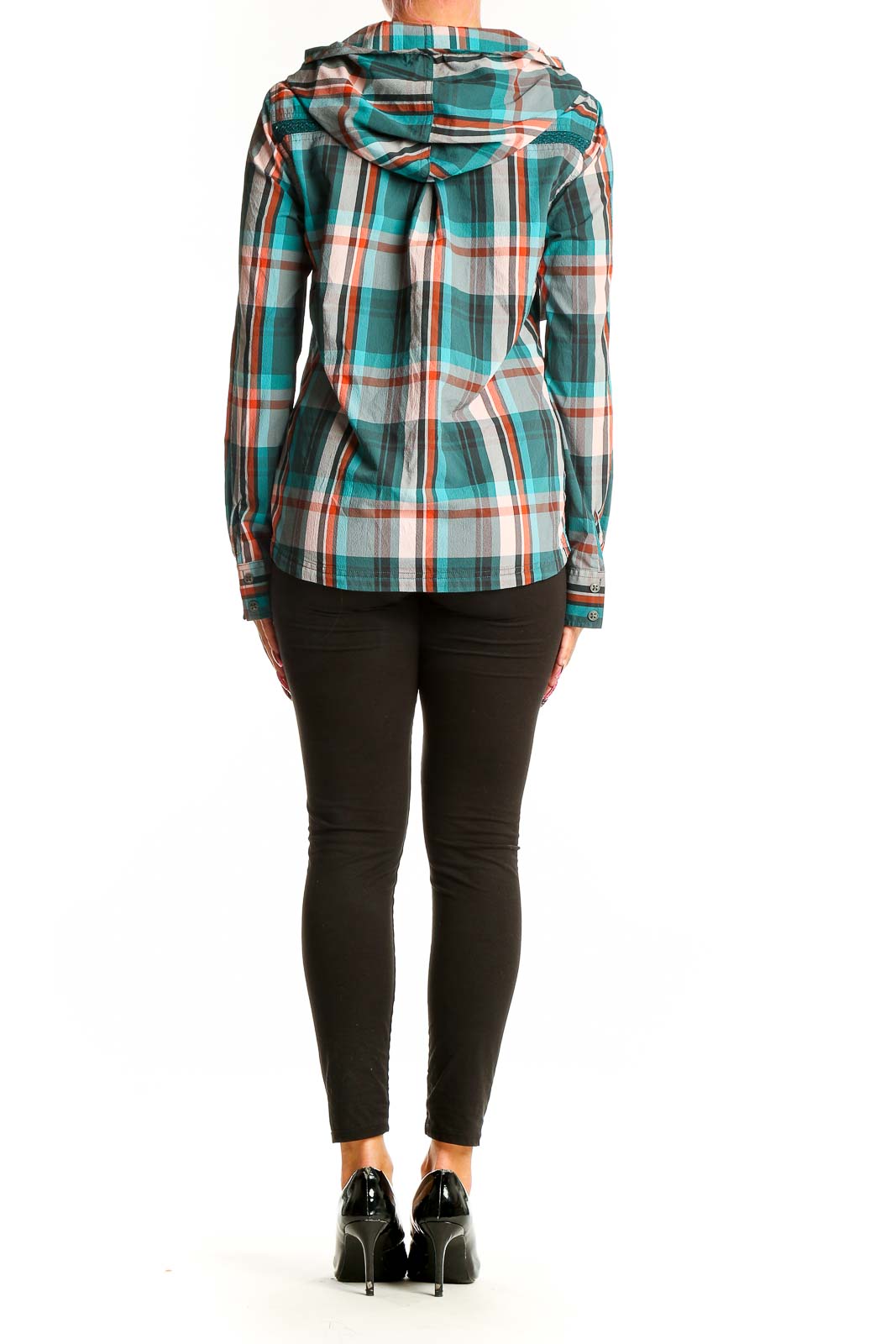 Side view of woman wearing teal plaid hooded button-up shirt from prAna