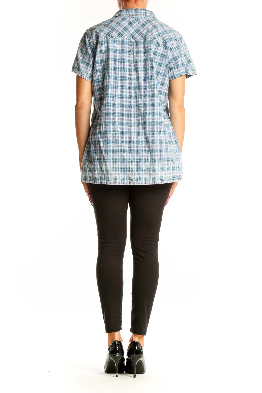 Side view of Orvis blue plaid cotton polo shirt on model with black pants