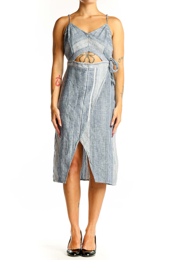 Front view of Express blue striped cotton-linen midi dress with cutout detail