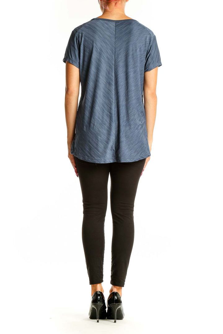 Side view of blue heathered Mountain Hard Wear performance t-shirt on model