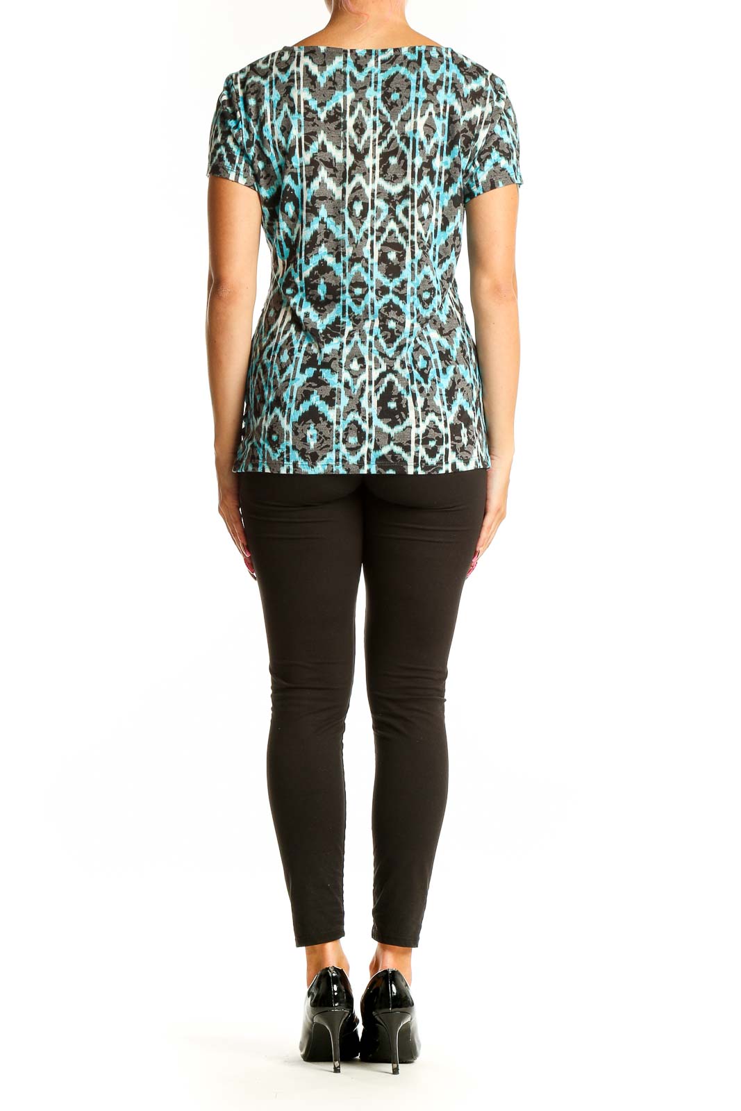 Side view of turquoise ikat print V-neck top with gathered waist by International Concepts
