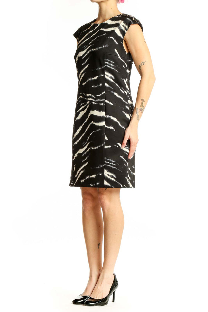 Front view of Michael Kors black and white zebra print sheath dress