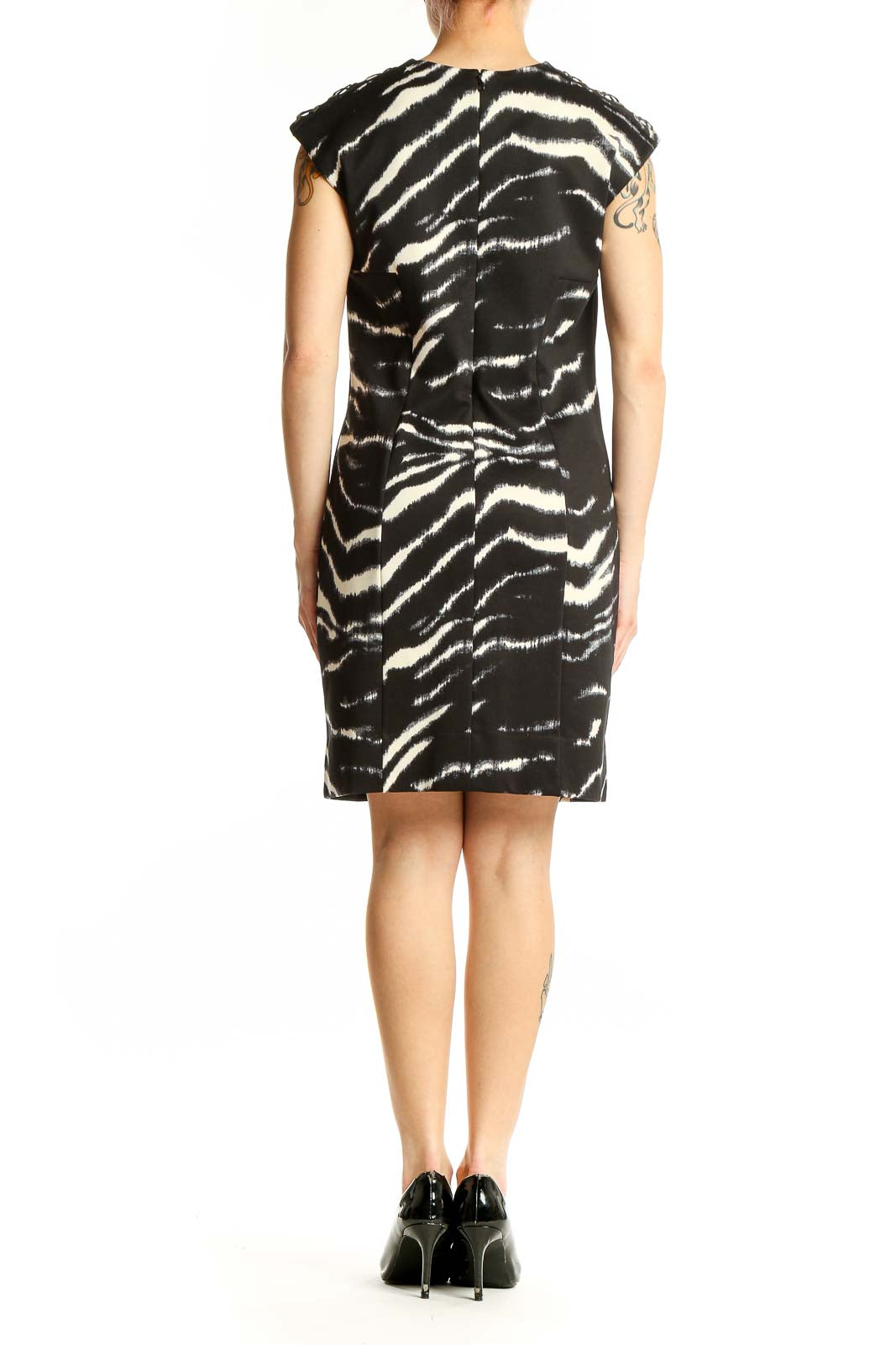 Side view of Michael Kors black and white zebra print sheath dress
