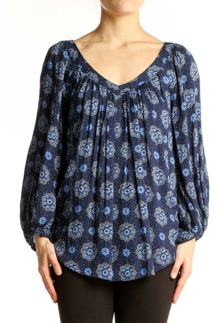 Front view of Maeve navy floral print blouse with balloon sleeves