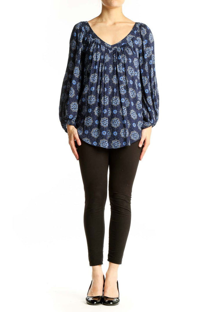 Front view of Maeve navy floral print blouse with balloon sleeves