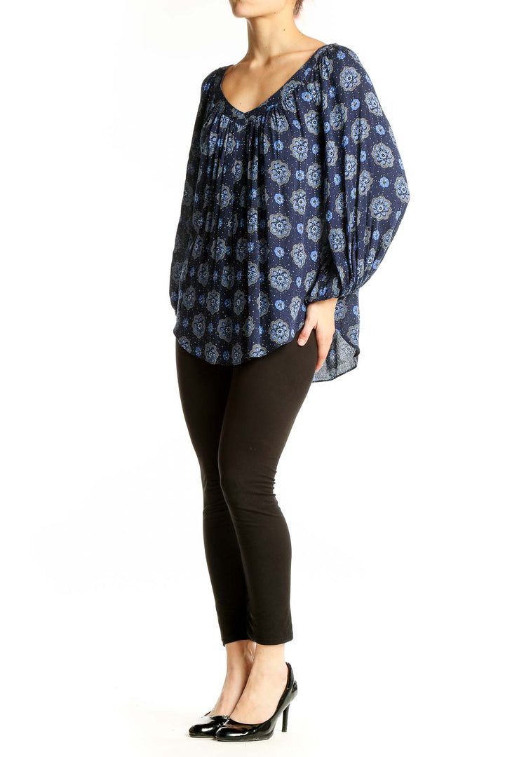 Front view of Maeve navy floral print blouse with balloon sleeves
