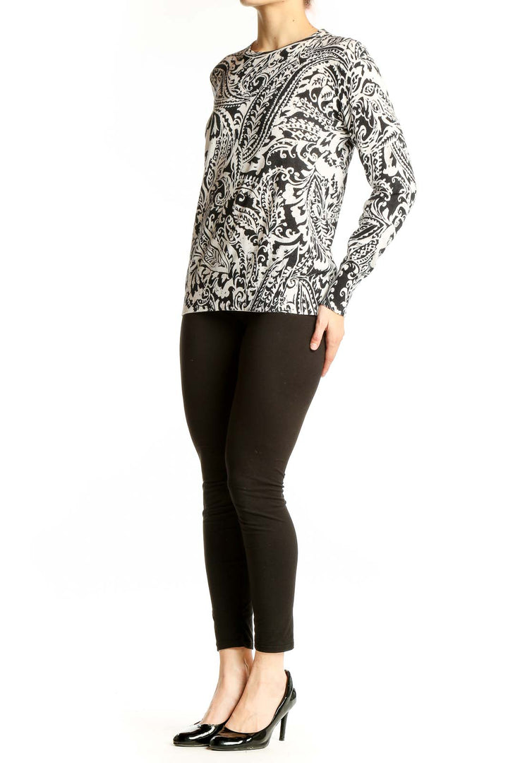 Front view of Lauren Ralph Lauren black and white paisley print knit sweater