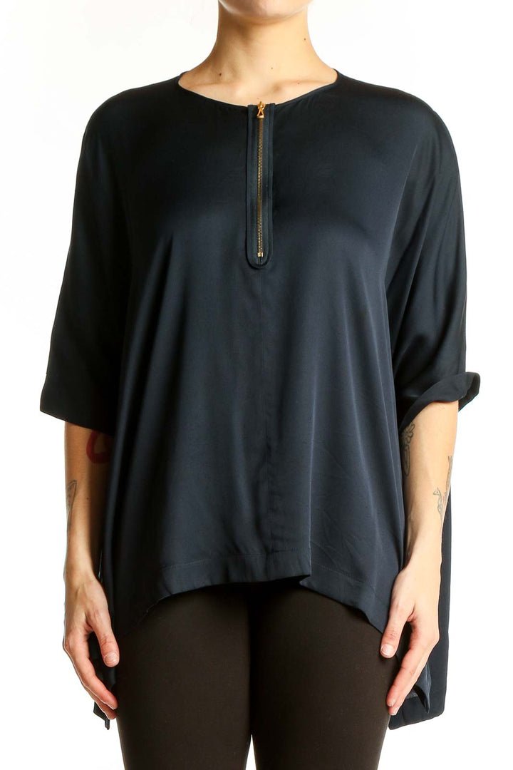 Front view of black oversized Vince blouse with zip-front detail