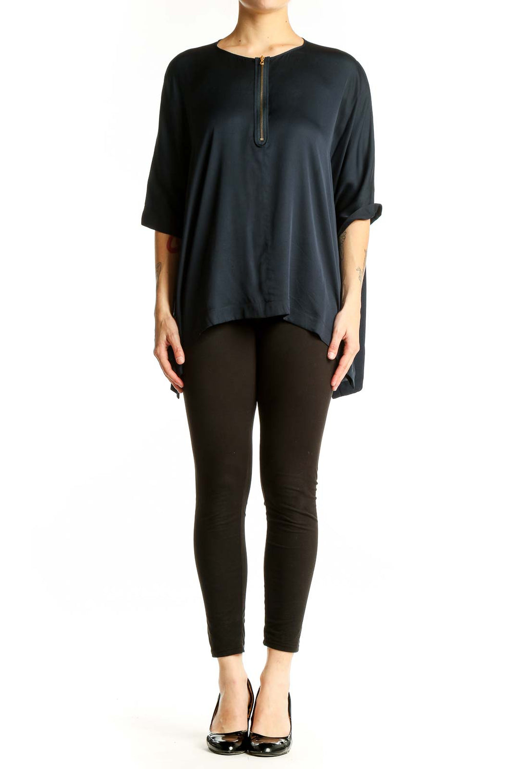 Front view of black oversized Vince blouse with zip-front detail
