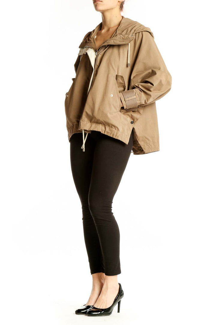 Front view of Zara beige hooded utility jacket with zip closure and pockets