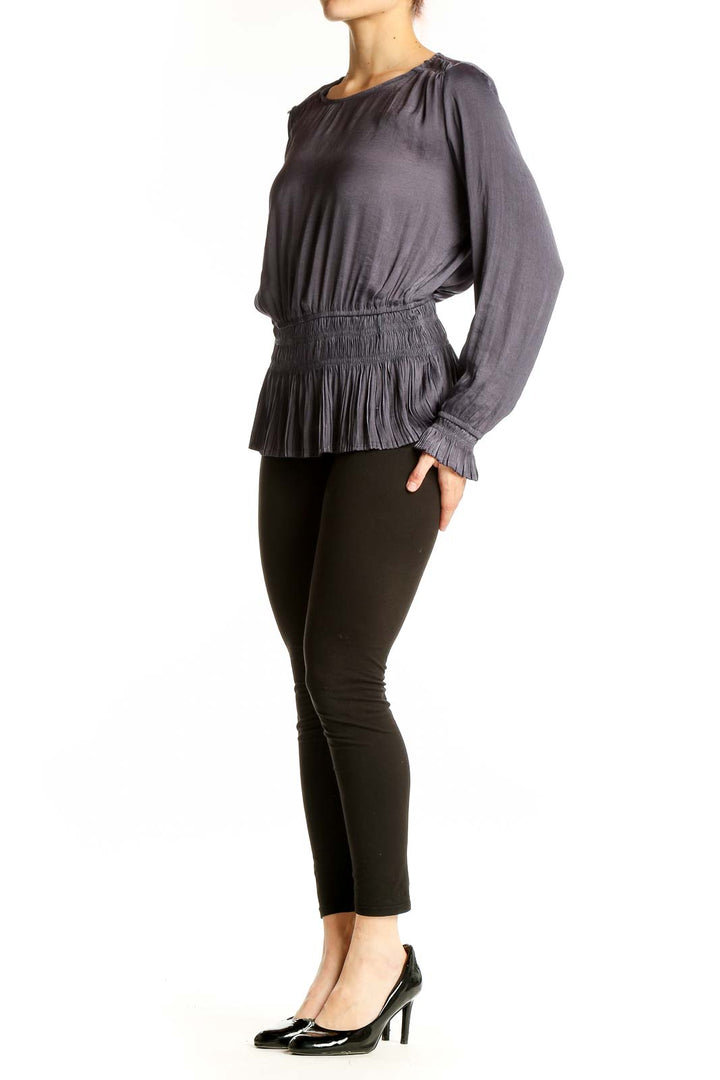 Front view of Tahari gray pleated peplum blouse with gathered neckline