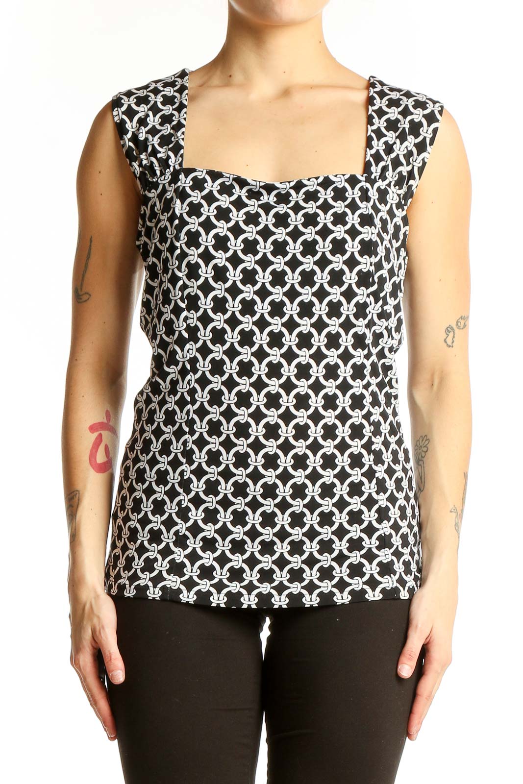 Front view of Black and White Geometric Print Sleeveless Top from White House Black Market