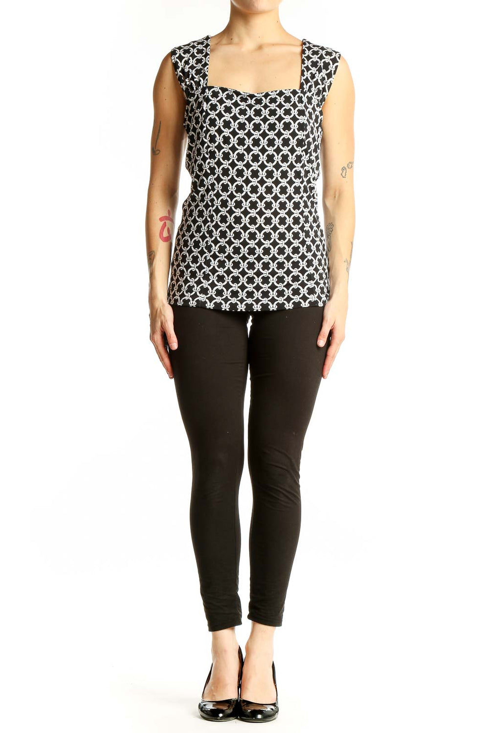 Front view of Black and White Geometric Print Sleeveless Top from White House Black Market