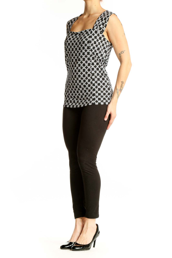 Front view of Black and White Geometric Print Sleeveless Top from White House Black Market