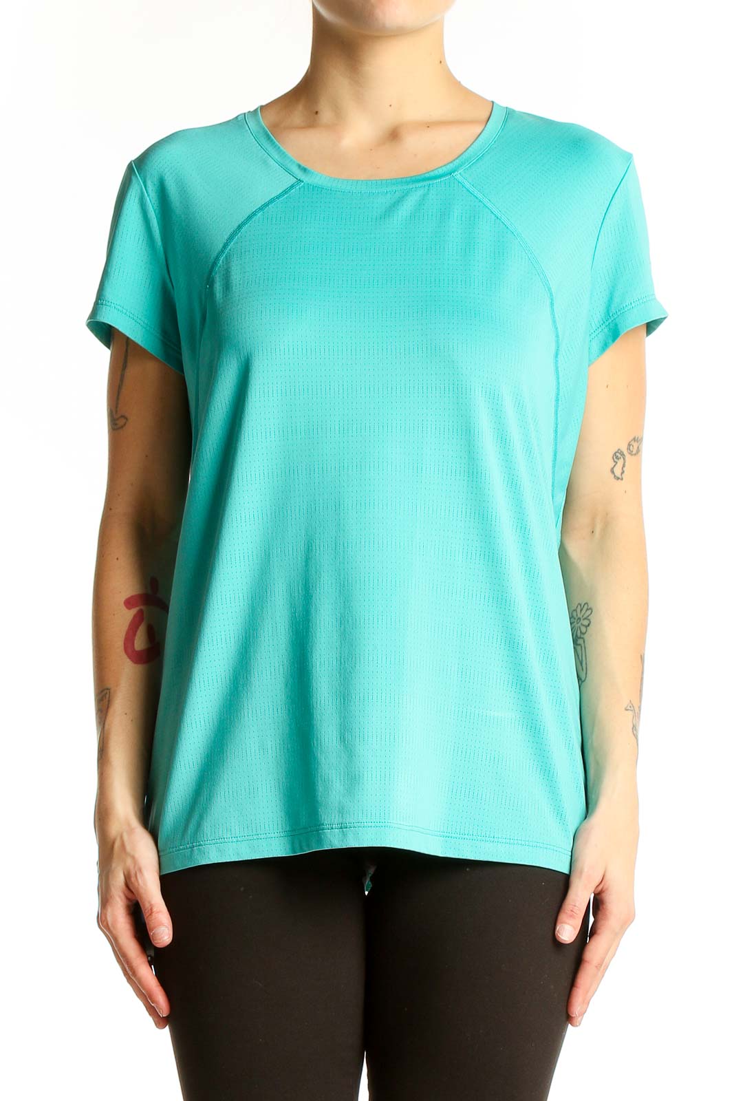 Front view of teal Columbia short-sleeve athletic top