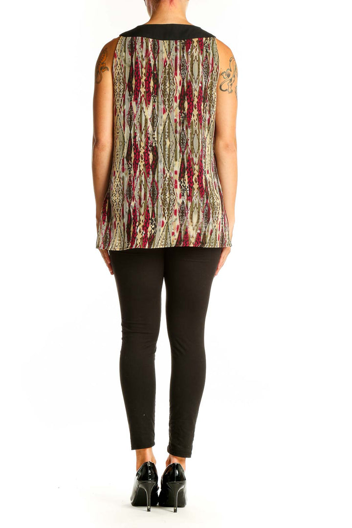 Side view of model wearing Signature by Larry Levine multicolor printed sleeveless blouse