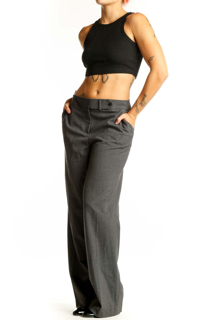Front view of Calvin Klein gray wide-leg dress pants on model