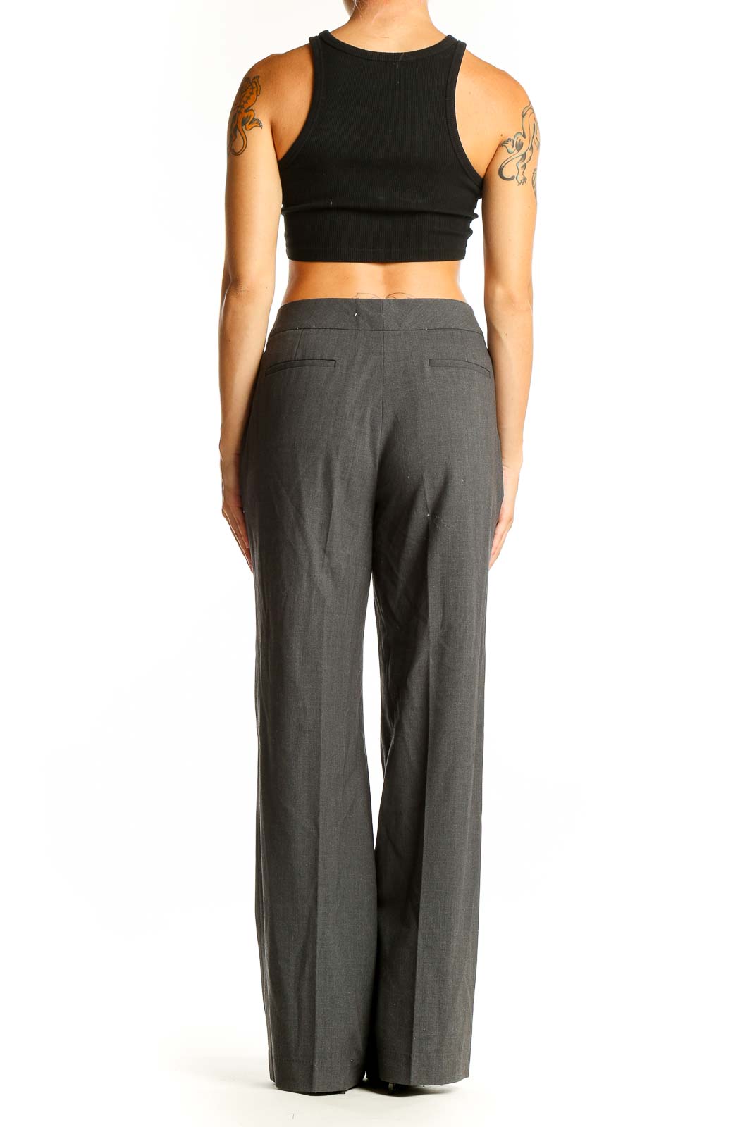 Back view of Calvin Klein gray wide-leg dress pants with black crop top