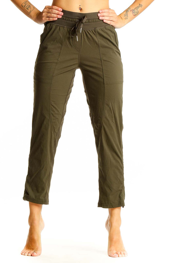 Front view of olive green Lululemon cropped pants with drawstring waist